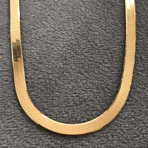 Gold herringbone necklace